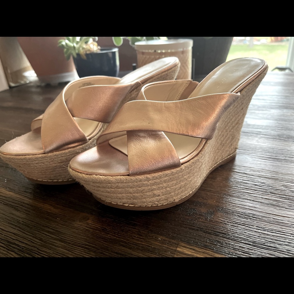 Nine West rose gold wedges. Very comfortable only wore once for a wedding!